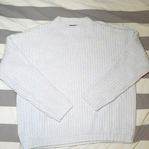 Silver grey knit sweater.